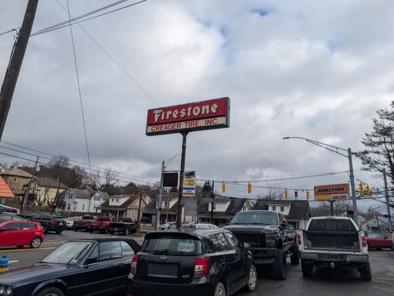 Creager Tire & Services Center storefront sign